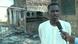 Taj-alseer Ahamed, Sudanese refugee in El Fasher speaks to DW in front of his destroyed house