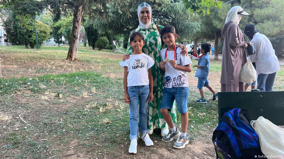 Alaa Alhatab sa svojom decom, Lin i Ajhamom