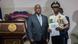 El primer ministro haitiano, Garry Conille, entrega el decreto de nombramiento a Normil Rameau, como nuevo director general de la Policía Nacional de Haití. El primer ministro haitiano, Garry Conille, entrega el decreto de nombramiento a Normil Rameau, como nuevo director general de la Policía Nacional de Haití.
