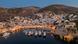 An early evening view of boats and yachts anchored at the Greek island of Hydra An early evening view of boats and yachts anchored at the Greek island of Hydra