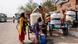 A girl fills water in a water cooler using a hose from a water tank attached to a three-wheeler cart on a hot summer day during a heatwave in New Delhi, India, June 3, 2024. A girl fills water in a water cooler using a hose from a water tank attached to a three-wheeler cart on a hot summer day during a heatwave in New Delhi, India, June 3, 2024.