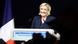 Die Ex-Parteichefin des RN, Marine Le Pen, steht der Parlamentswahl in Frankreich lächelnd auf einer Bühne Die Ex-Parteichefin des RN, Marine Le Pen, steht der Parlamentswahl in Frankreich lächelnd auf einer Bühne