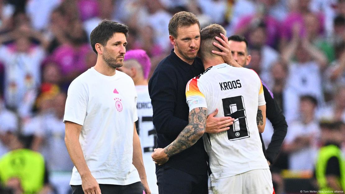 Germany coach Julian Nagelsmann comforts midfielder Tony Kroos following the team's exit from Euro 2024, in Stuttgart, Germany, on July 5th 2024