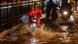 A delivery person rides an electric scooter in a waterlogged subway after heavy rains in Mumbai, India, July 8, 2024 A delivery person rides an electric scooter in a waterlogged subway after heavy rains in Mumbai, India, July 8, 2024