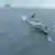 El Ejército chino envió sus fuerzas naval y aérea para monitorear el tránsito del barco canadiense. (Imagen de archivo 23.05.2024)
