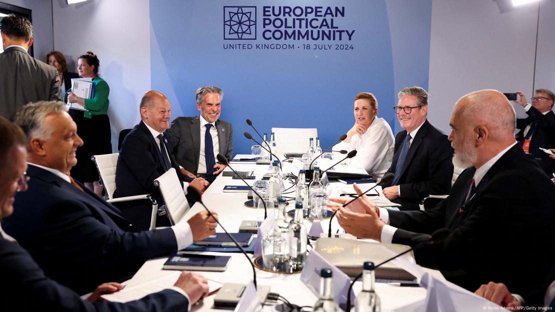 From left to right: Hungary's Prime Minister Viktor Orban, Germany's Chancellor Olaf Scholz, Netherlands' Prime Minister Dick Schoof, Denmark's Prime Minister Mette Frederiksen and Albania's Prime Minister Edi Rama sitting around a table, talking