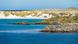 Playa de arena blanca cerca de Puerto Stanley, en un día soleado en las islas Malvinas. (Imagen de archivo) Playa de arena blanca cerca de Puerto Stanley, en un día soleado en las islas Malvinas. (Imagen de archivo)