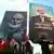 Hamas supporters hold signs depicting Ismail Haniyeh