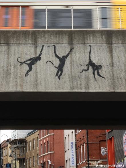 Banksy shredded artwork sells for over $25 million – DW – 10/14/2021