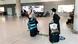 Travelers in Orthodox Jewish attire roll their trolley bags through Larnaca International Airport Travelers in Orthodox Jewish attire roll their trolley bags through Larnaca International Airport