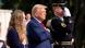 Trump and some relatives of US service members killed in Afghanistan at Arlington National Cemetery Trump and some relatives of US service members killed in Afghanistan at Arlington National Cemetery