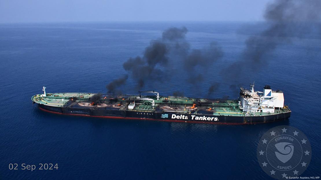 Smoke and fire can be seen aboard the Greek-owned oil tanker Sounion off the coast of Hodeida in the Red Sea.