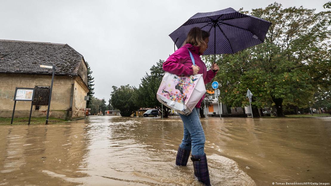 A resident walks in a flooded street in the town of Stupava, situated a few kilometers west of Bratislava, Slovakia, on September 15, 2024 A resident walks in a flooded street in the town of Stupava, situated a few kilometers west of Bratislava, Slovakia, on September 15, 2024