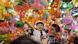 Visitors shop for colorful handmade lanterns hung inside a market in Hong Kong Visitors shop for colorful handmade lanterns hung inside a market in Hong Kong
