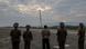 North Korean leader Kim Jong-un looks on during the test of what KCNA described as a new tactical ballistic missile North Korean leader Kim Jong-un looks on during the test of what KCNA described as a new tactical ballistic missile
