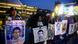 Familiares de víctimas de Ayotzinapa muestran carteles con fotos de los desaparecidos. Familiares de víctimas de Ayotzinapa muestran carteles con fotos de los desaparecidos.