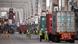 Dockworkers processing containers at a US port Dockworkers processing containers at a US port