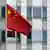 Chinese flag outside a building 