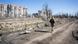 A Ukrainian soldier walks in the almost-abandoned town of Vuhledar A Ukrainian soldier walks in the almost-abandoned town of Vuhledar