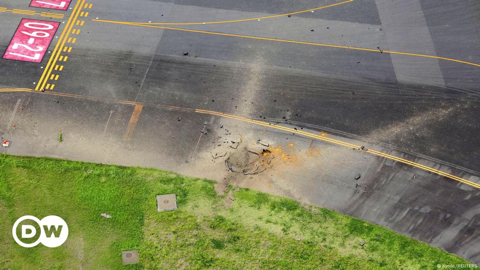 Japan airport restarts flights after WWII bomb blast