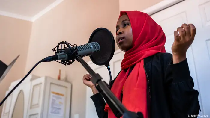 Munira Kaoneka, a podcaster from Tanzania, records her narration at a podcast training in Cape Town, South Africa