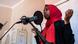 Munira Kaoneka, a podcaster from Tanzania, records her narration at a podcast training in Cape Town, South Africa