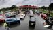 Cars queue up at a gas station Cars queue up at a gas station