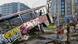 A photo from 1997 by Jordis Antonia Schloesser showing a boy playing in a graffiti-covered bus in the backyard of the Kunstehaus Tacheles. A photo from 1997 by Jordis Antonia Schloesser showing a boy playing in a graffiti-covered bus in the backyard of the Kunstehaus Tacheles.