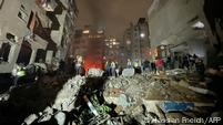 Salvage work in a residential area of Beirut after new Israeli attacks