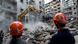 Rescue workers use an excavator to clear the rubble of destroyed buildings as they search for victims at the site of Thursday's Israeli airstrike, in Beirut, Lebanon, Friday, Oct. 11, 2024. Rescue workers use an excavator to clear the rubble of destroyed buildings as they search for victims at the site of Thursday's Israeli airstrike, in Beirut, Lebanon, Friday, Oct. 11, 2024.