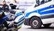 German police vehciles, a bike and car, parked German police vehciles, a bike and car, parked