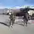 Pakistani soldiers stand at checkpoint on road in Kurram district in 2017