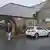 A man steps out after praying in a local mosque in Bradford