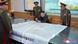 Kuzey Kore lideri Kim Jong Un, askeri yetkililer ile bir harita başında Kuzey Kore lideri Kim Jong Un, askeri yetkililer ile bir harita başında
