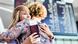 Portrait of young teenage girl reunting with her mother in airport Portrait of young teenage girl reunting with her mother in airport