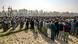 Relatives and mourners gather during the funeral procession of a doctor, a day after he was killed in a terror attack. Relatives and mourners gather during the funeral procession of a doctor, a day after he was killed in a terror attack.