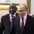 Russian President Vladimir Putin meets with South African President Cyril Ramaphosa 