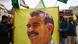 Kurds in Greece hold up a banner with an image of jailed PKK leader Abdullah Ocalan Kurds in Greece hold up a banner with an image of jailed PKK leader Abdullah Ocalan