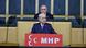 Devlet Bahçeli partisinin TBMM grubunda, üzerinde MHP logosu bulunan kürsüde konuşuyor Devlet Bahçeli partisinin TBMM grubunda, üzerinde MHP logosu bulunan kürsüde konuşuyor