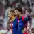 Lamine Yamal (r) and Raphael Dias Belloli (Raphinha, l) smile and gesture as they celebrate during FC Barcelona's resounding 4-0 defeat of Real Madrid in the traditional El Clasico match on Saturday, October 26, 2024