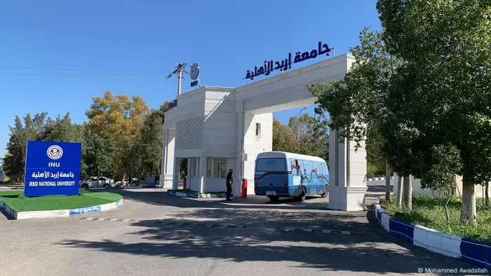 The MIL bus enters Irbid National University