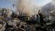 Civil defense workers extinguish a fire as smoke rises from the site of an Israeli airstrike in Dahiyeh Civil defense workers extinguish a fire as smoke rises from the site of an Israeli airstrike in Dahiyeh