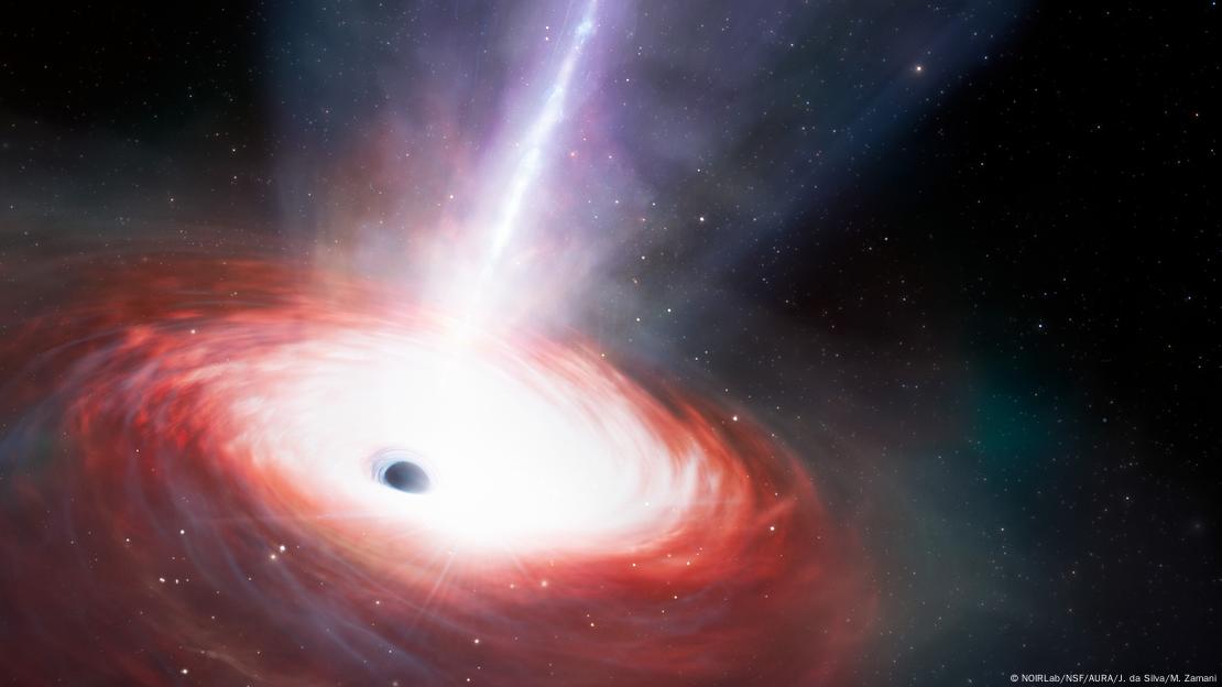 Esta ilustración artística muestra un agujero negro que se alimenta rápidamente y emite potentes flujos de gas. En el universo primitivo, los agujeros negros supermasivos crecieron a gran velocidad, hecho que intriga a los astrónomos.