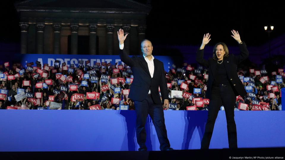 Democratic presidential nominee Vice President Kamala Harris, right, and second gentleman Doug Emhoff depart at the conclusion of a campaign rally outside the Philadelphia Museum of Art, Monday