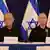 Benjamin Netanyahu and Yoav Gallant at a press conference in front of Israeli flags