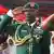 Nigeria Chief of Army Staff Lt. Gen. Taoreed Lagbaja salutes during a funeral ceremony for officers in Abuja, Nigeria