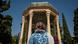 An Iranian woman who is not wearing a mandatory headscarf stands in front of the tomb of the 14th-century Iranian poet, Hafez, in Shiraz, Iran An Iranian woman who is not wearing a mandatory headscarf stands in front of the tomb of the 14th-century Iranian poet, Hafez, in Shiraz, Iran