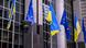 Флаги Евросоюза и Украины перед зданием Еврокомиссии в Брюсселе Флаги Евросоюза и Украины перед зданием Еврокомиссии в Брюсселе