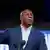 Magic Johnson speaks at a Kamala Harris campaign event in October 2024