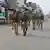 Policemen patrol on the deserted streets of Sambhal, in the northern Indian state of Uttar Pradesh, Monday, November 25, 2024